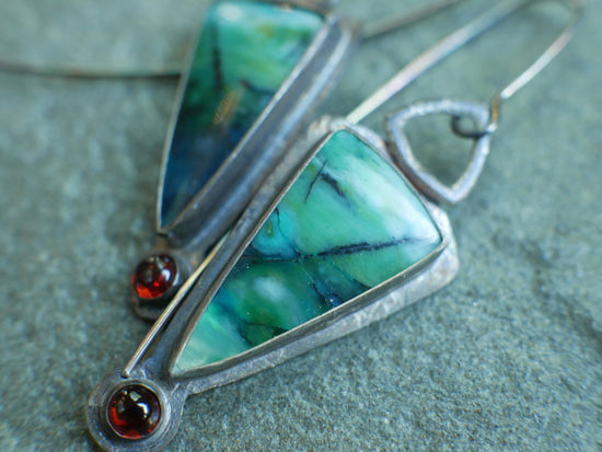 Deep Water Secrets — Blue Opalized Wood and Garnet Dangle Earrings in Oxidized Sterling Silver