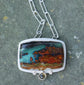 The Cliffs — A Petrified Wood Opal Landscape Necklace in Sterling Silver