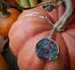 Secret Garden — A Plume Petrified Wood and Serpentine Necklace in Sterling Silver and Brass