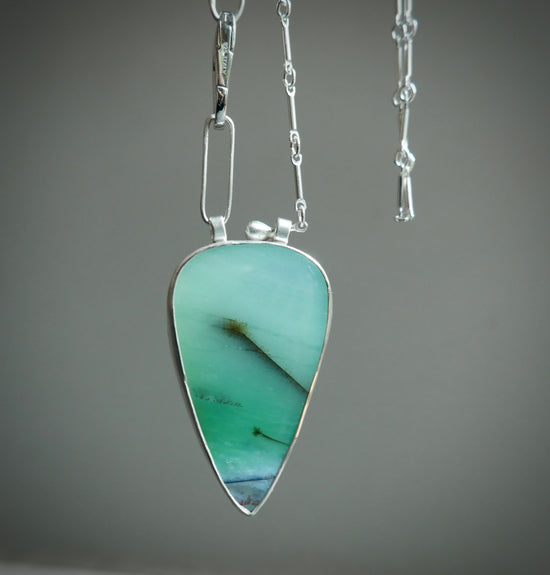 Hidden Scenes — Deep Sea Dive; A Petrified Blue Wood Opal Pendant Necklace in Sterling Silver