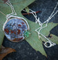 Secret Garden — A Plume Petrified Wood and Serpentine Necklace in Sterling Silver and Brass