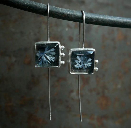 Frozen in Time: Swinging Snowflakes — A Pair of Bridewell Stone Drop Earrings in Sterling Silver