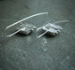 Frozen in Time: Swinging Snowflakes — A Pair of Bridewell Stone Drop Earrings in Sterling Silver