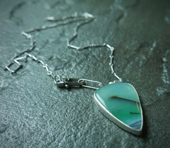 Hidden Scenes — Deep Sea Dive; A Petrified Blue Wood Opal Pendant Necklace in Sterling Silver