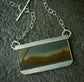 Recalling The Moonlight — A Cherry Creek Jasper Reversible Landscape Pendant Necklace in Sterling Silver
