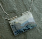 Rocky Mountain High — An Opalized Petrified Wood Landscape Pendant in Sterling Silver