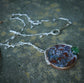 Secret Garden — A Plume Petrified Wood and Serpentine Necklace in Sterling Silver and Brass
