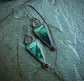 Deep Water Secrets — Blue Opalized Wood and Garnet Dangle Earrings in Oxidized Sterling Silver