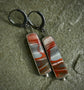 Swirling Embers — A Pair of Wonderstone Dangle Earrings in Oxidized Silver