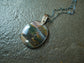 Up with the Morning Dew — An Opalized Petrified Wood Pendant Necklace in Oxidized Silver and 14kt Gold
