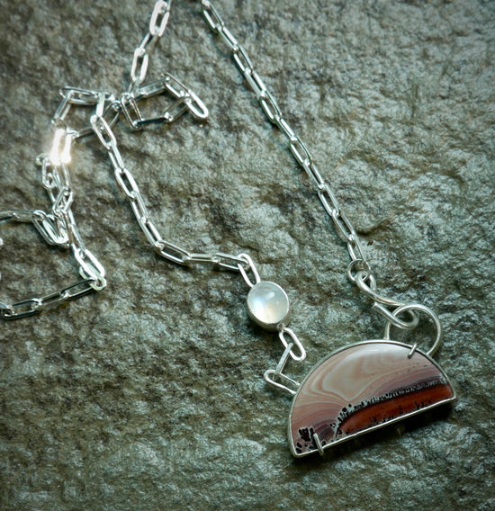 Burgundy Dreamscape — A Mimbres Dendritic Rhyolite and Moonstone Landscape Pendant Necklace in Sterling Silver