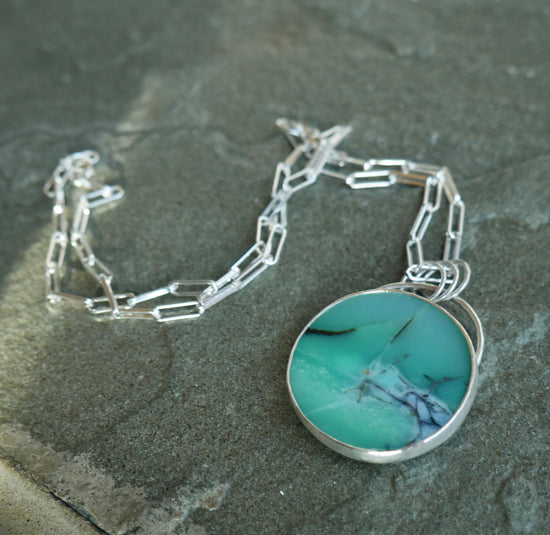 Into the Deep Blue — A Blue Opalized Wood Pendant Necklace in Sterling Silver