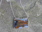 Different Worlds — A Petrified Wood Landscape Pendant Necklace in Sterling Silver