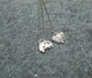 Dangling Stars — A Mismatched Pair of Dendritic Agate Dangle Earrings in Sterling Silver