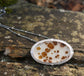 Cinnamon Daisy Field — A Dendritic Agate Necklace in Sterling Silver